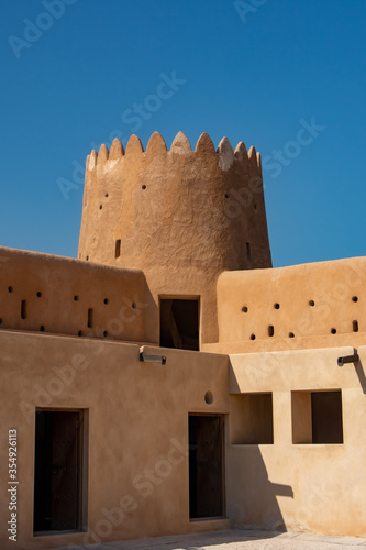 Obraz na plátně Interior corner of Al Zubarah Fort with circular tower and two levels of solider
