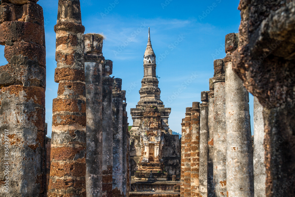 Fototapeta premium Wat Mahathat, Sukhothai old city, Thailand. Ancient city and culture of south Asia.