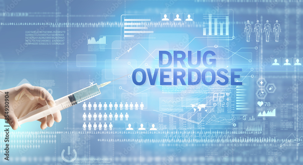 Close-up view of doctor's hand in a white glove holding syringe with DRUG OVERDOSE inscription, healthcare and medical concept Close-up view of doctor's hand in a white glove holding syringe with DRUG OVERDOSE inscription, healthcare and medical concept