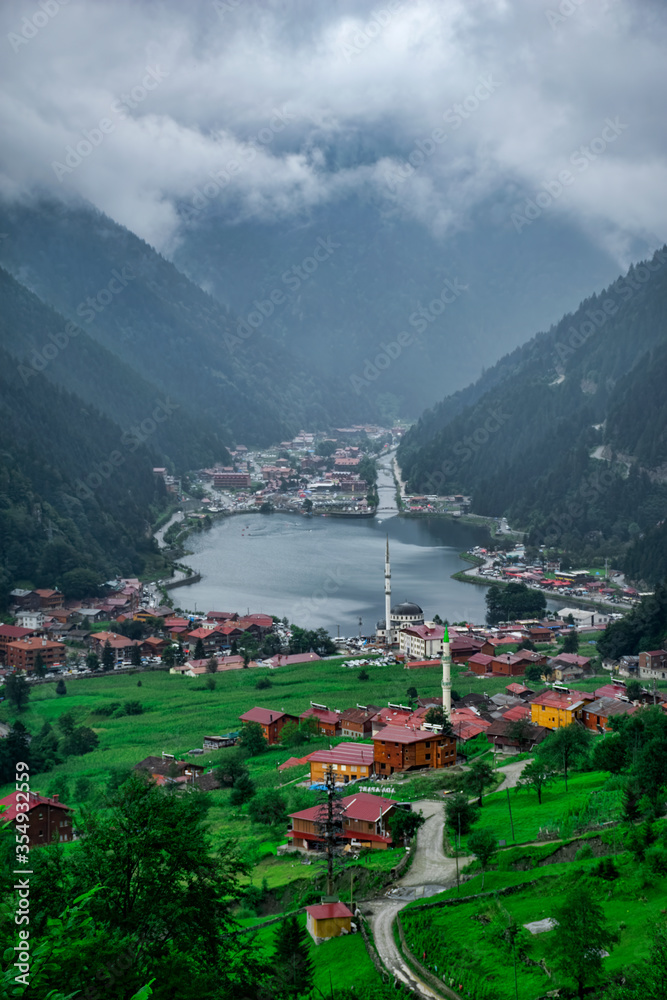 Uzungol lake view (Long lake) top view of the mountains and lake in Trabzon. Popular summer destination for tourists.
