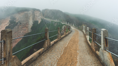 La Coupee view of Sark bridge in fog and mist