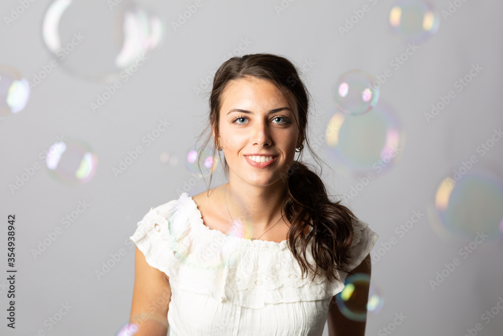Beautiful young model with bubble in the air. Beautiful young model with bubble in the air.