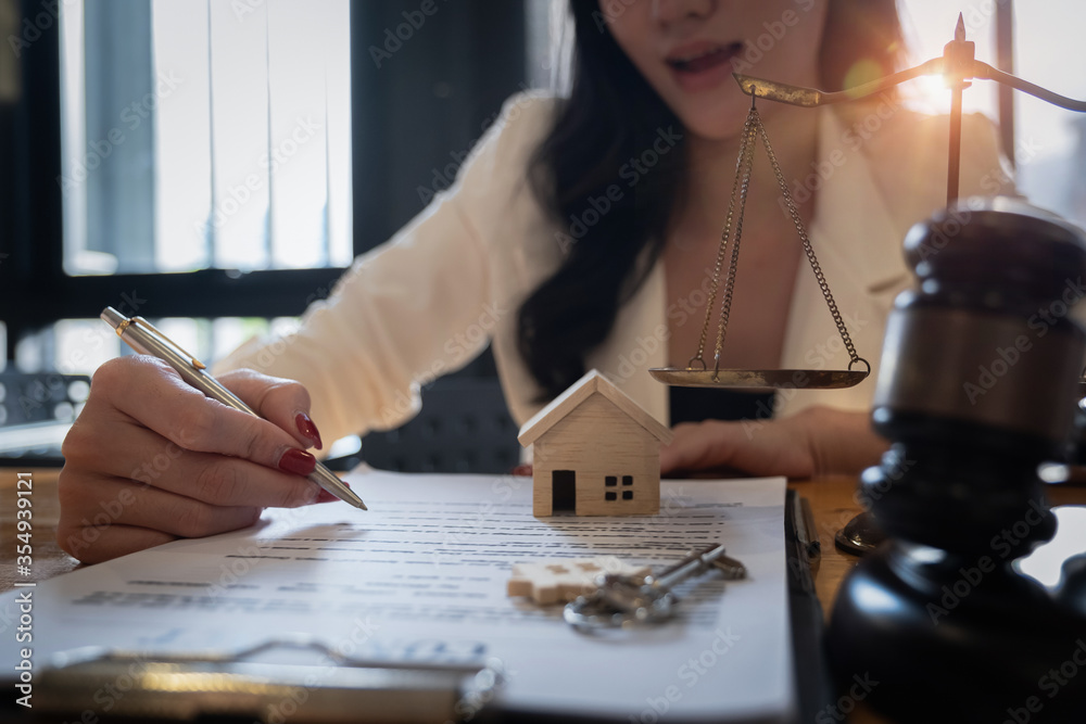 Obraz premium Lawyer checking agreement document before sending to client.