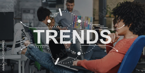 The word Trends written on blurred office background