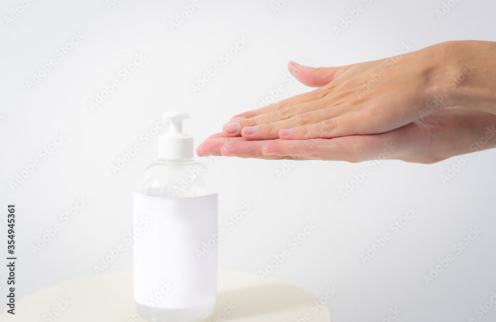 Hand of lady cleaning hands with alcohol gel or anti bacteria soap to stop germ, bacteria, virus. Covid19 coronavirus prevention Hand of lady cleaning hands with alcohol gel or anti bacteria soap to stop germ, bacteria, virus. Covid19 coronavirus prevention