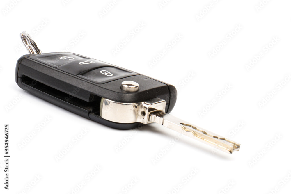 Modern folding car key isolated on white background Modern folding car key isolated on white background