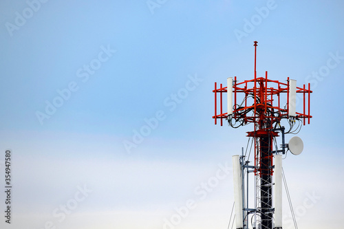 Telecommunication tower, broadcast pole, telephone transceiver or antenna with blue sky. Radio and satellite pole. Communication technology. Telecommunication industry. Mobile or telecom 4g 5g network