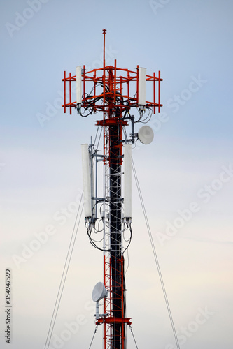 Telecommunication tower, broadcast pole, telephone transceiver or antenna. Radio and satellite pole. Communication technology. Telecommunication industry. Mobile or telecom 4g 5g network.