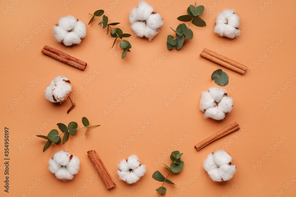 Beautiful composition with cotton flowers on color background