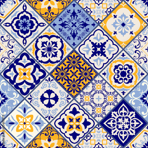 Azulejos tiles patchwork. Seamless colorful patchwork. Hand drawn seamless abstract pattern. Majolica pottery tile, blue, yellow azulejo. Original traditional Portuguese and Spain decor. Vector photo