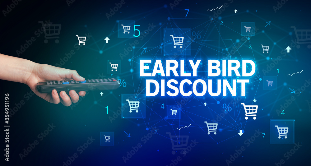 hand holding wireless peripheral with EARLY BIRD DISCOUNT inscription, online shopping concept hand holding wireless peripheral with EARLY BIRD DISCOUNT inscription, online shopping concept