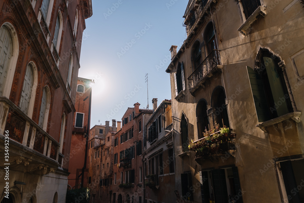 Venice buildings in the sunset rays, Italy.