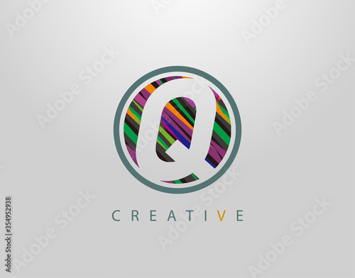 Creative Q Letter Logo. Modern Abstract Circle Geometric Initial Q Icon Design, sreated rith strips with pop art coloring. photo