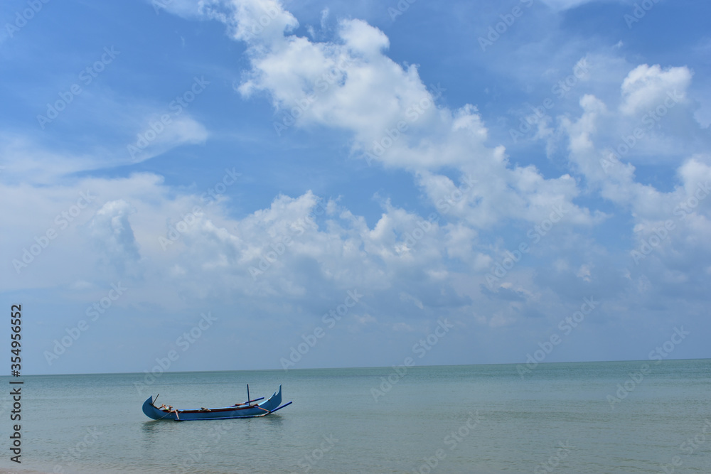Boat on the ocean. Tanjung Tinggi Beach, Belitung, Bangka Belitung island, Indonesia