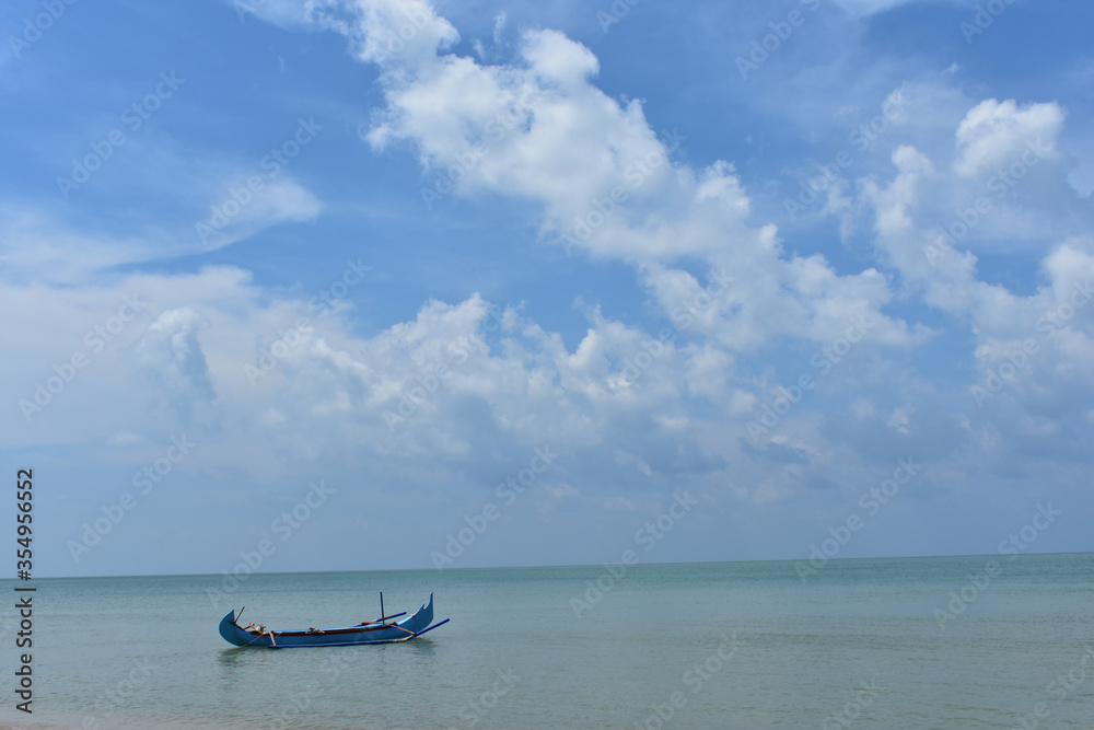 Boat on the ocean. Tanjung Tinggi Beach, Belitung, Bangka Belitung island, Indonesia Boat on the ocean. Tanjung Tinggi Beach, Belitung, Bangka Belitung island, Indonesia