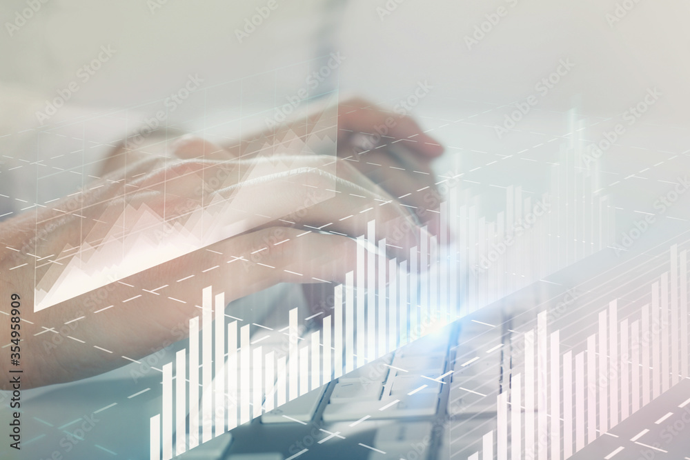 Multi exposure of graph with man typing on computer in office on background. Concept of hard work. Closeup. Multi exposure of graph with man typing on computer in office on background. Concept of hard work. Closeup.