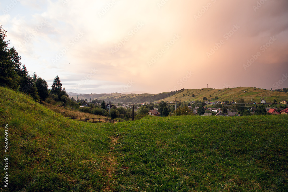 Fototapeta premium Sunset in the Carpathians. The Carpathians are a beautiful country of mountains. Carpathians are located in Ukraine. In the Carpathians, beautiful nature and many good people.