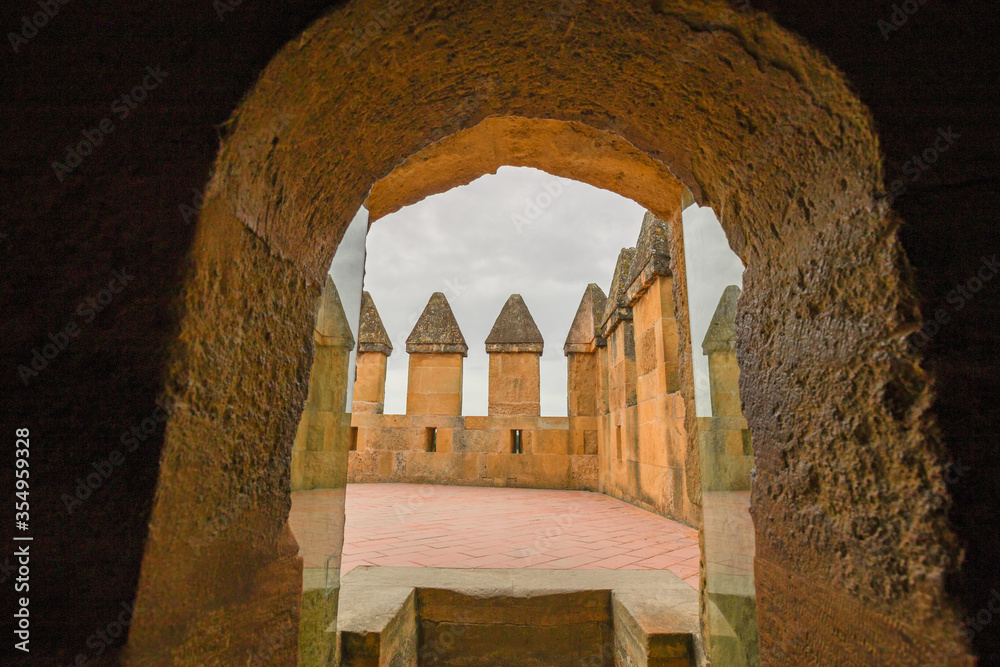 View of the walls of the Alcázar de los Reyes Cristianos in Cordoba, Spain.