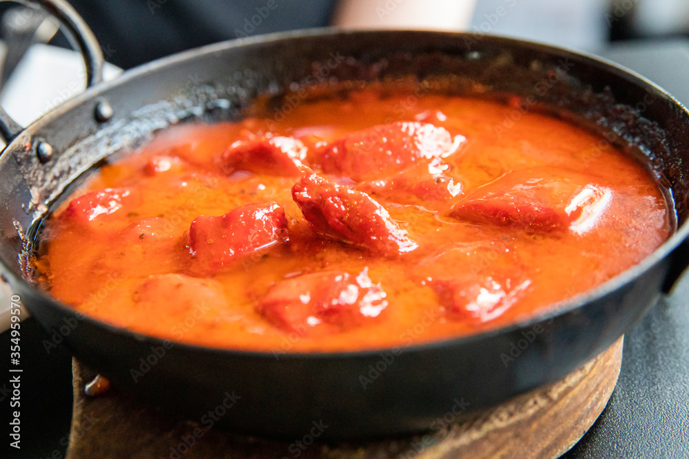 Quadro su tela Indian Curry food photography close up. Mild chicken makhani