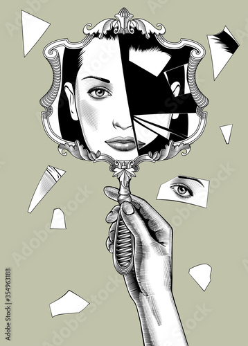 Female hand holding a broken retro mirror with a woman face reflection