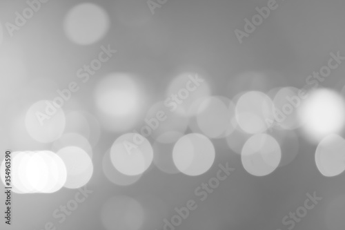 Gray and white bokeh lights defocused, Abstract blurred background.