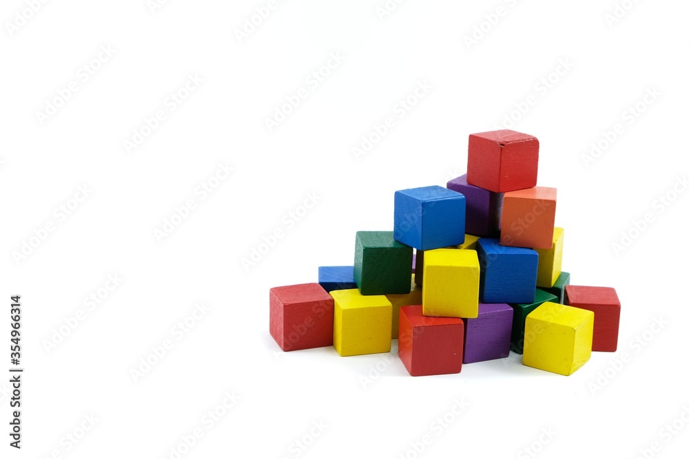 Obraz premium Colorful wooden building blocks for kids isolate on white blackground.