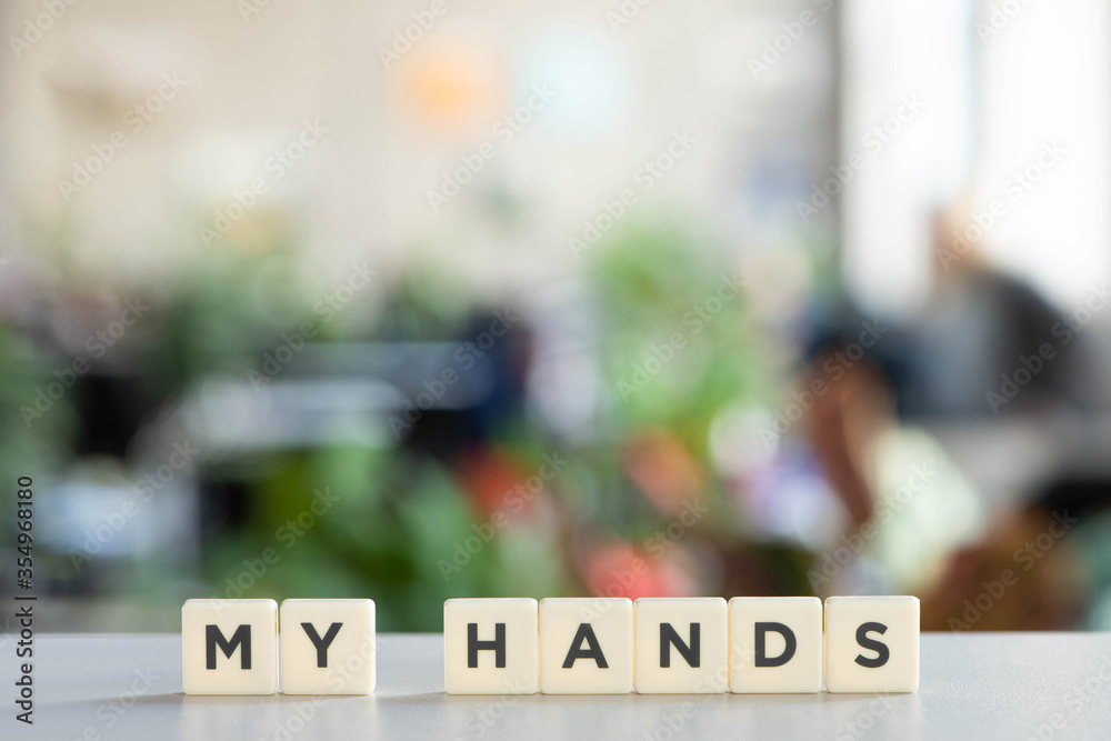 Fototapeta premium white cubes with my hands lettering on white surface