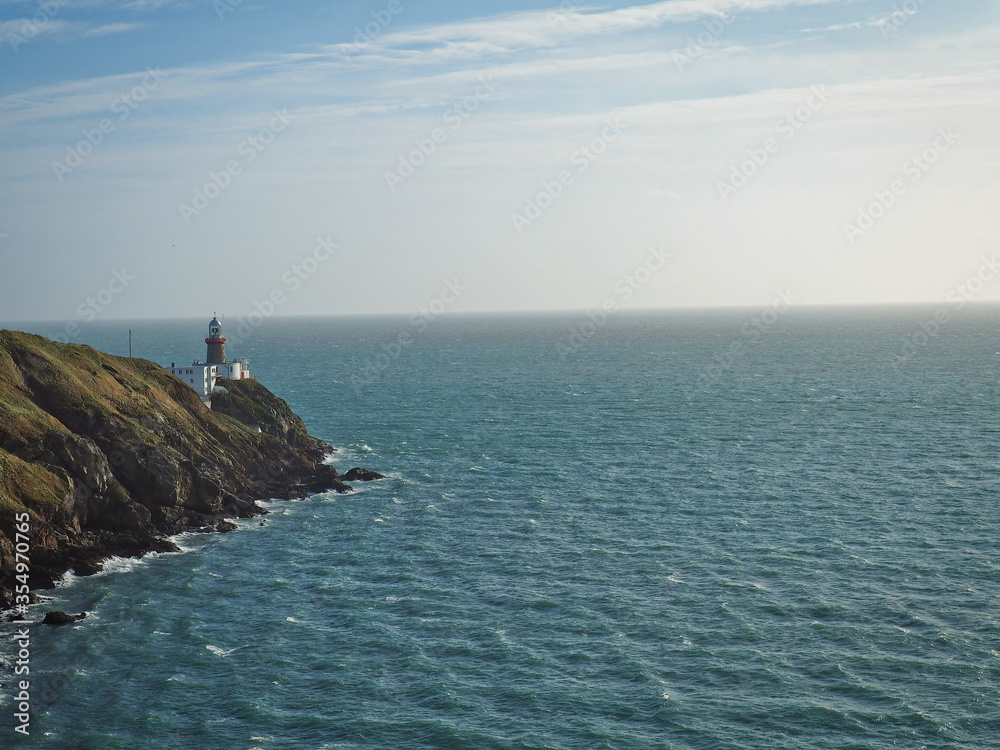 Baily lighthouse in Ireland near Dublin, peninsula sea