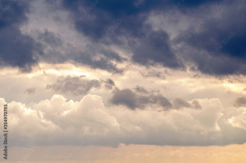 Beautiful stormy cumulus clouds in the sky, background. Beautiful stormy cumulus clouds in the sky, background.