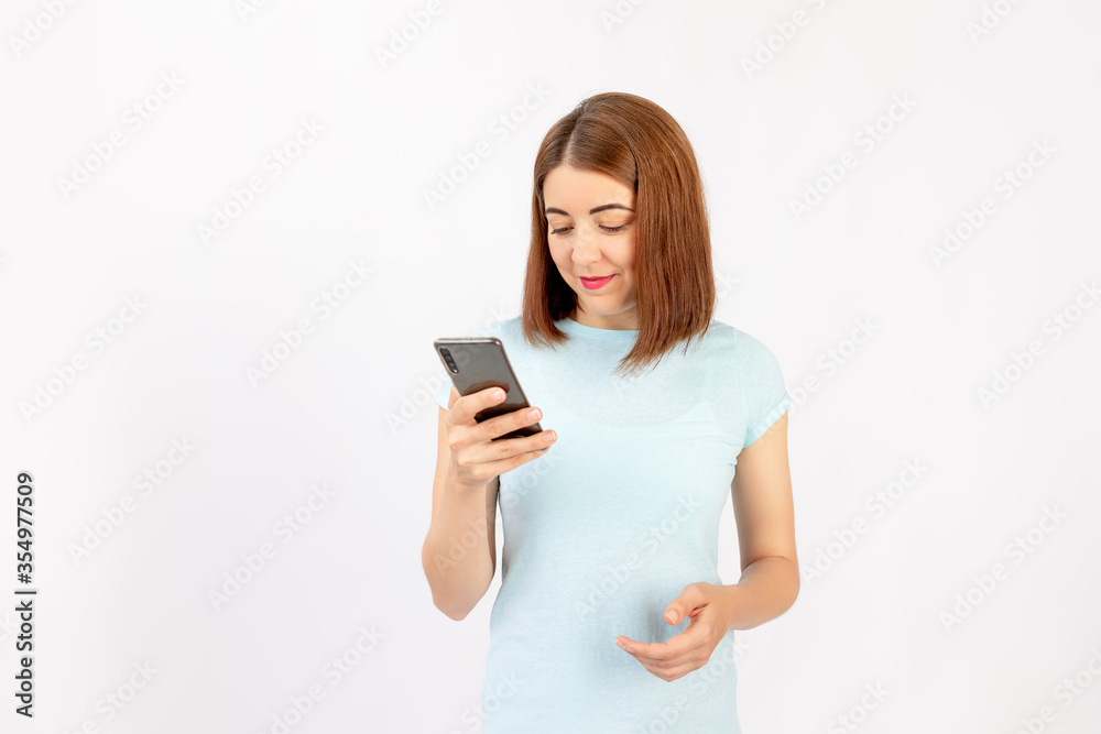 Happy business woman with a cell phone. Isolated on white background. Happy business woman with a cell phone. Isolated on white background.