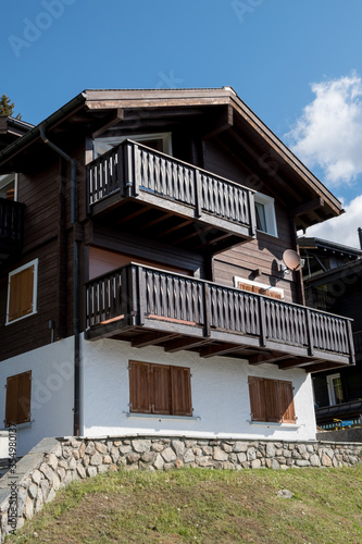 Empty holiday apartments in a touristic area, closed blinds (shutter), no tourists as consequences of the pandemic