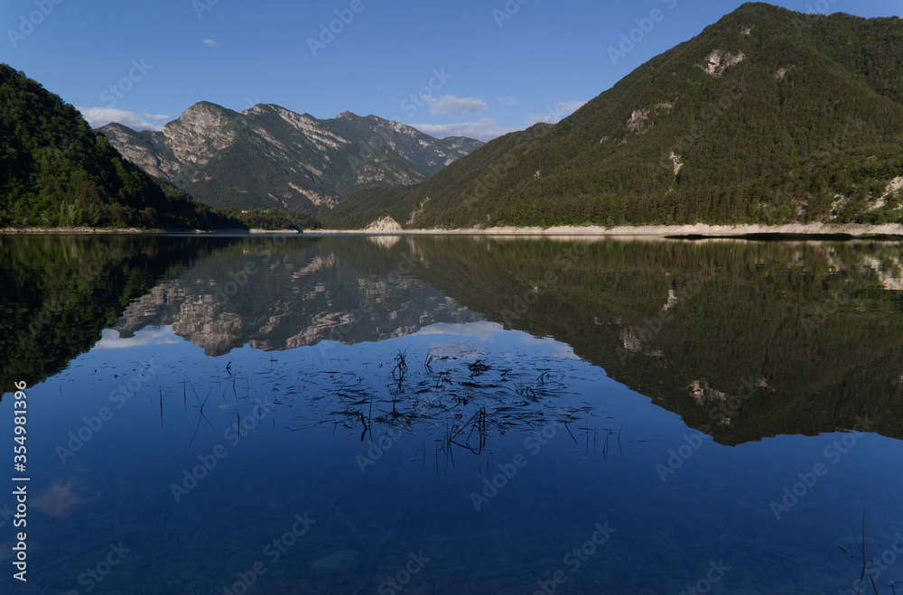 Fototapeta premium The beautiful morning landscape of the Redona Lake, Italy