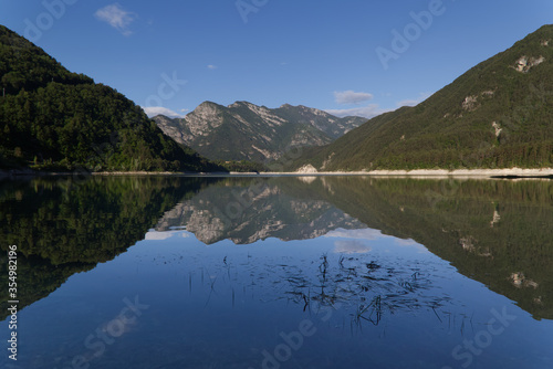 The beautiful morning landscape of the Redona Lake, Italy
