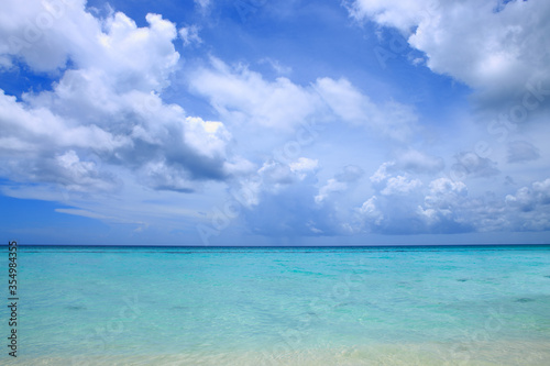 Caribbean sea and clouds sky. Travel background.