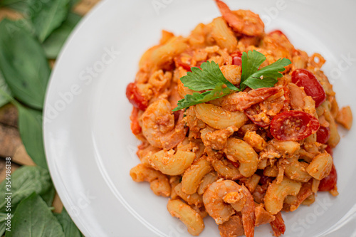 Stir fried macaroni with prawn on a natural background