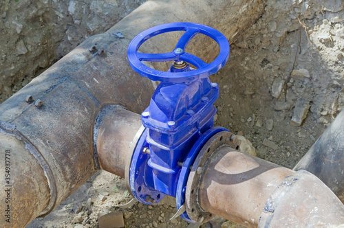 Wallpaper Mural blue wheel valve with pipe Torontodigital.ca