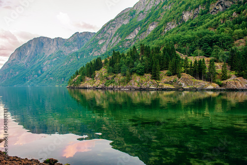 Beautiful idyllic mountain landscape. Gudvangen, a popular tourist village located at the beginning of Naeroyfjord