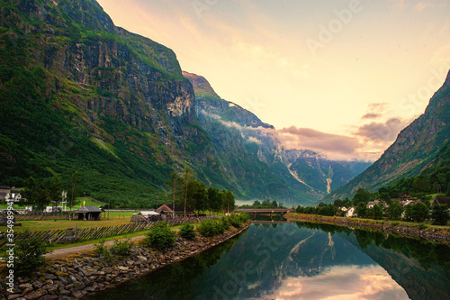 Beautiful idyllic mountain landscape. Gudvangen, a popular tourist village located at the beginning of Naeroyfjord