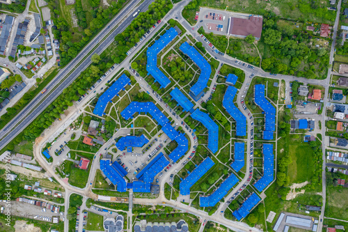 Aerial view of the housing estate with blue roofs. Estate Sloviki located on Witosa street is also called " Smurfs" Olkusz, Poland.