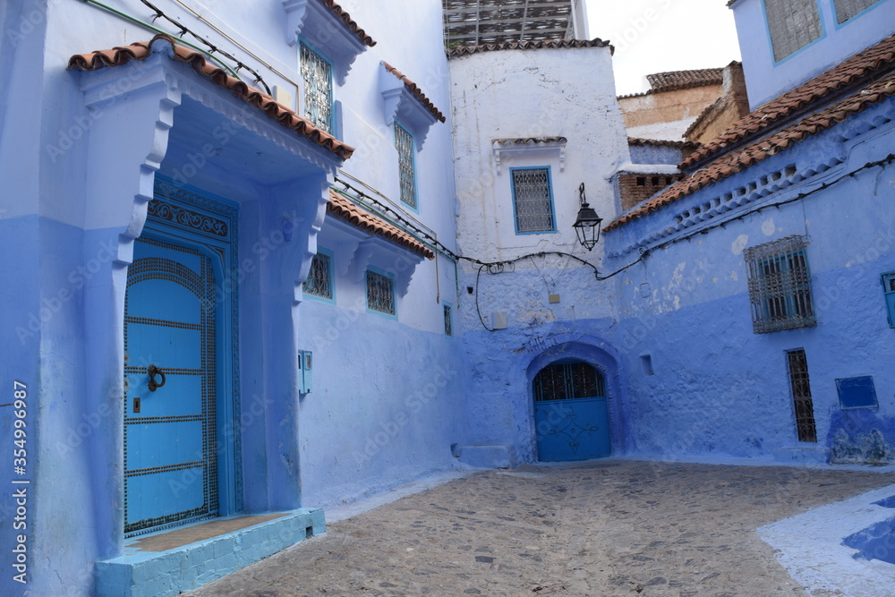 Blue painted doors in the city of Chefchaouen, Morocco