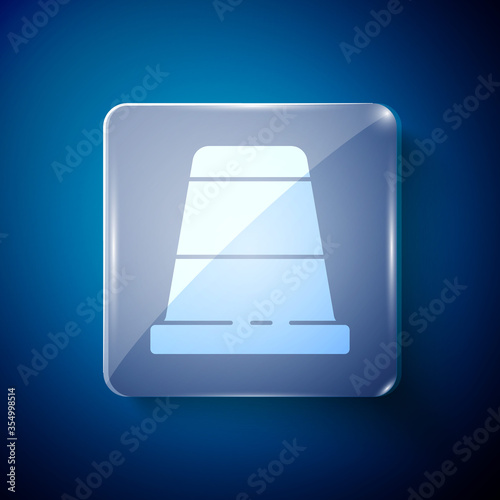 White Thimble for sewing icon isolated on blue background. Square glass panels. Vector Illustration