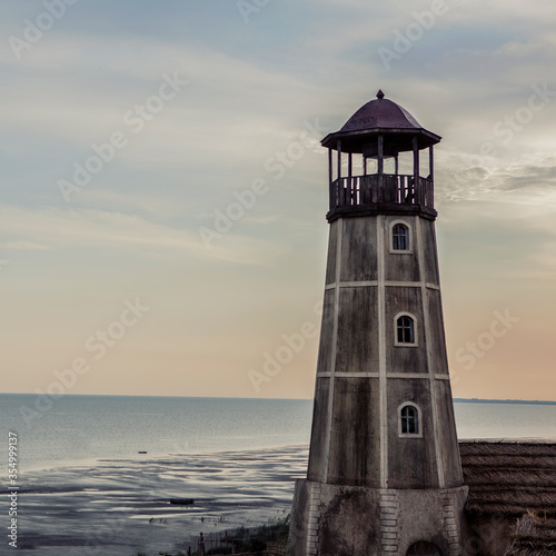 lighthouse, light, sea, coast, sky, ocean, tower, architecture, building, sunset, beacon, safety, water, clouds, blue, landscape, landmark, house, navigation, white, old, island, beach, travel, point