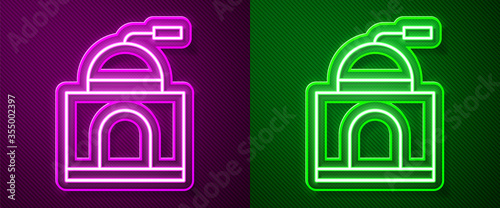 Glowing neon line Manual coffee grinder icon isolated on purple and green background. Vector Illustration