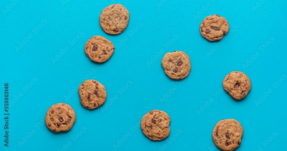 Chocolate chip cookies animation. Cookies moving on blue background