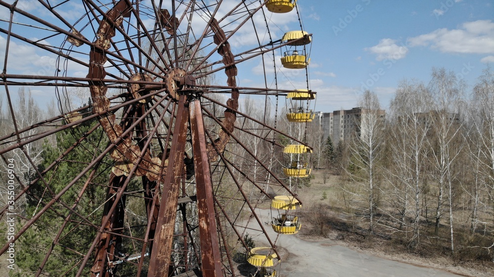 The abandoned Ferris wheel in the amusement park in Pripyat. aerial photography. Chernobyl exclusion zone The abandoned Ferris wheel in the amusement park in Pripyat. aerial photography. Chernobyl exclusion zone