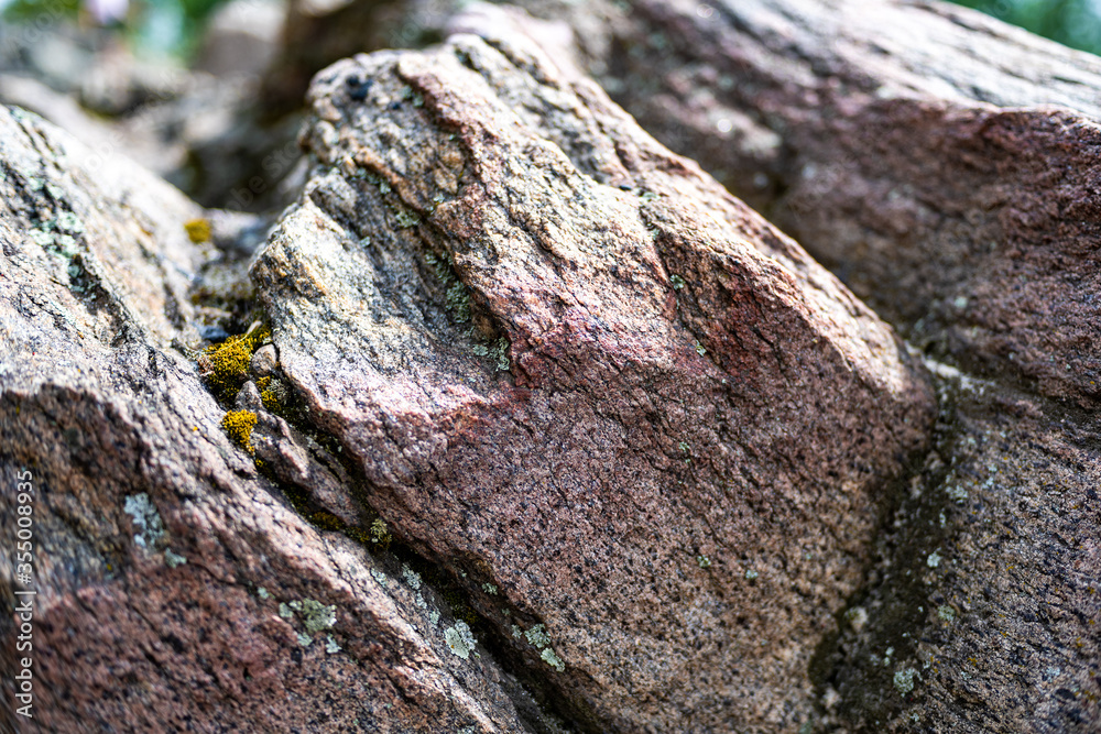 Fragment of red granite. Red granite close up. Granite texture, granite background. Fragment of red granite. Red granite close up. Granite texture, granite background.