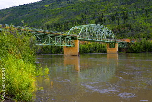 The Bridge over the Stewart River in Stewart Crossing. It is a settlement in Yukon, Canada. Located about 179 km east of Dawson City on the Klondike Highway, near the junction with the Silver Trail photo