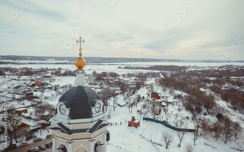 Orthodox monastery in the classical style in the city near Moscow with a Golden dome photo