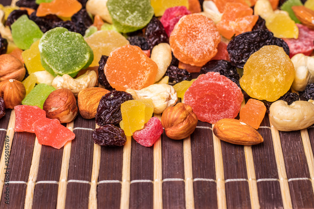 Dried fruits and nuts on a bamboo napkin Dried fruits and nuts on a bamboo napkin