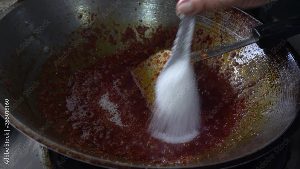 Stir fried curry in the pan. Thai style food